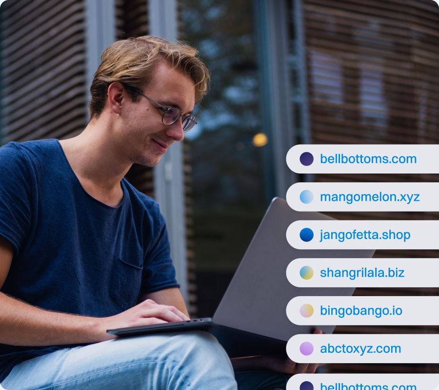 Person using a laptop while reviewing suggested domain names, including bellbottoms.com, mangomelon.xyz, jangofetta.shop, shangrilala.biz, bingobango.io, and abctoxyz.com, displayed in a modern domain search interface.